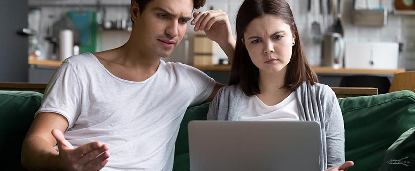 ALS-Millennial couple annoyed by stuck laptop